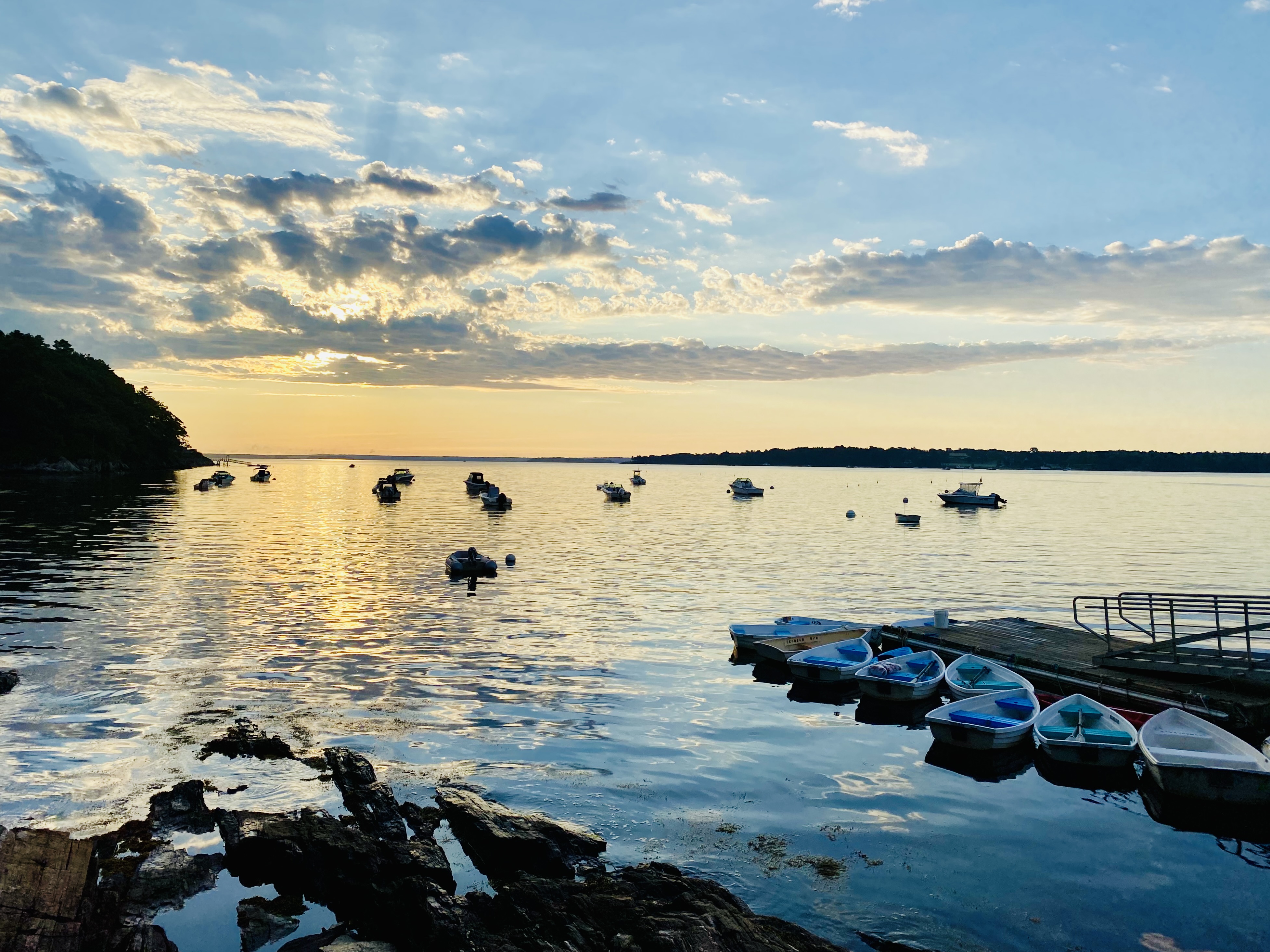 Summer evening view from the Littlejohn Island dock, looking out across Casco Bay at sunset