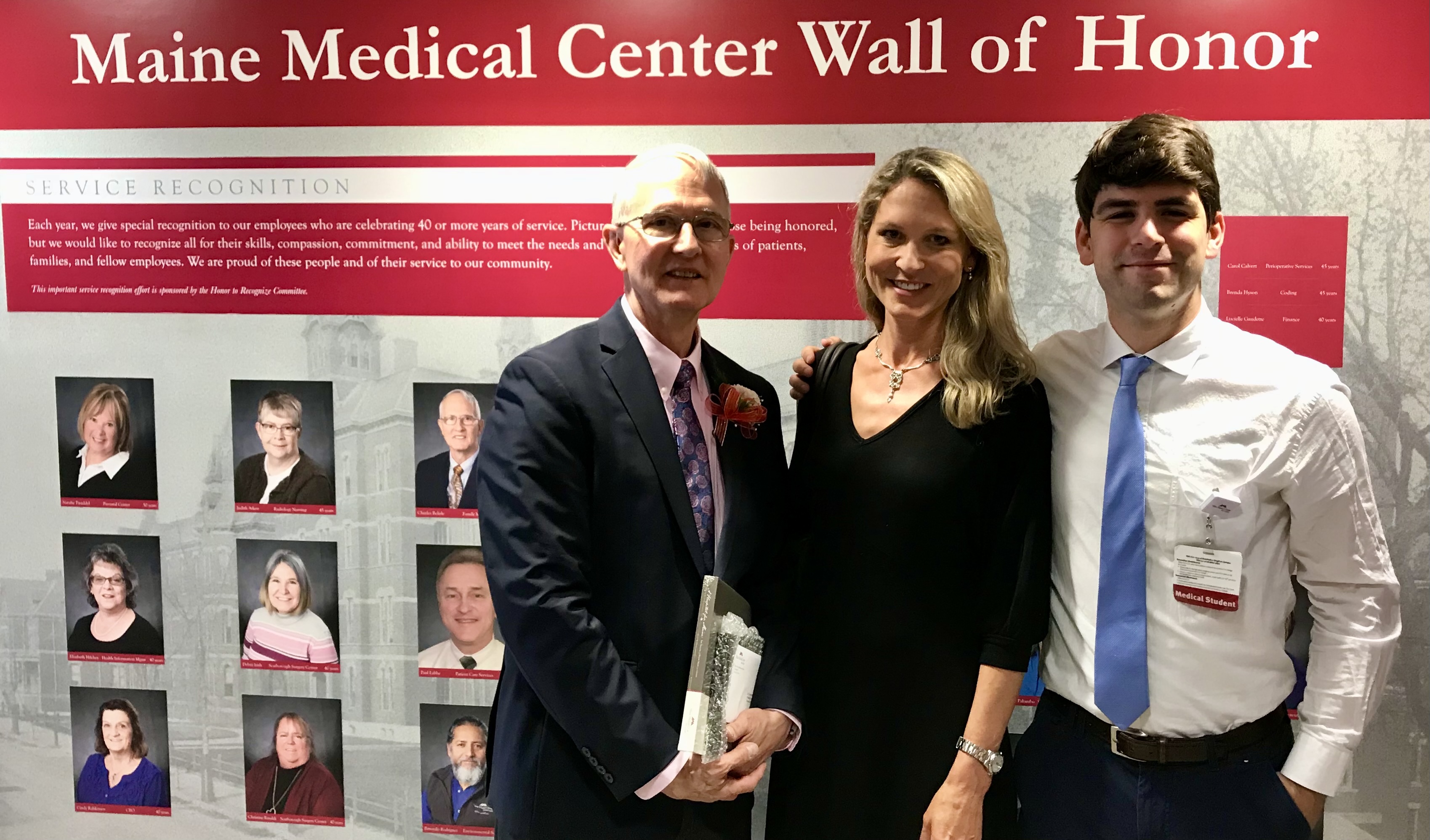 Dr. Charles Belisle, Dr. Lisa Belisle, and Dr. Campbell Belisle Haley at the Maine Medical Center Wall of Honor